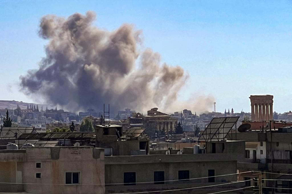 Smoke billows from the site of an Israeli airstrike.