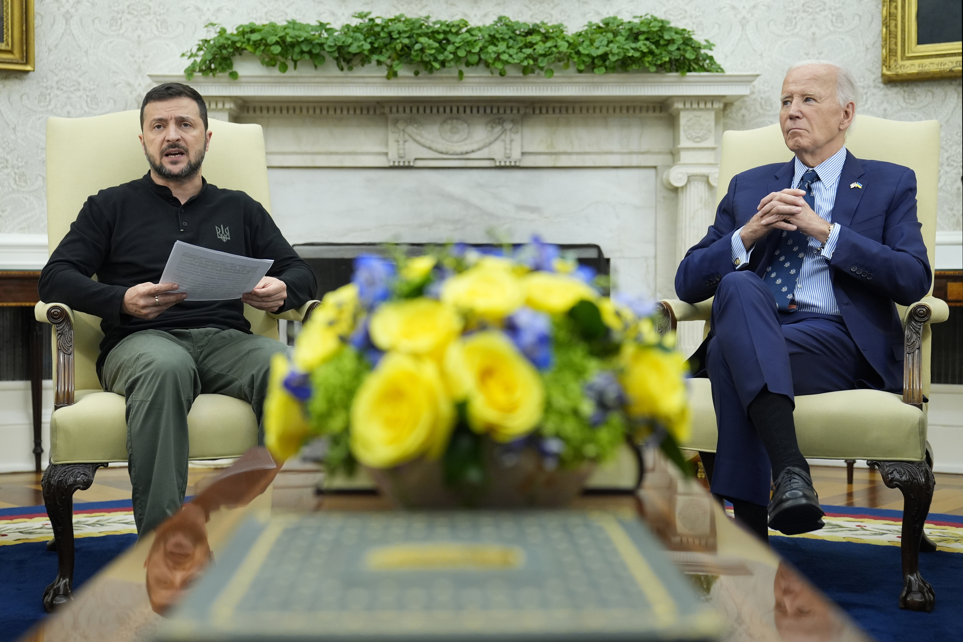 President Joe Biden, right, listens as Ukraine's President Volodymyr Zelenskyy.