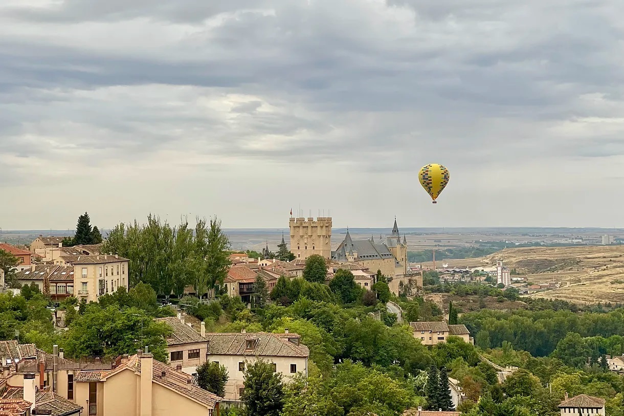 Balloons flying over Segovia.