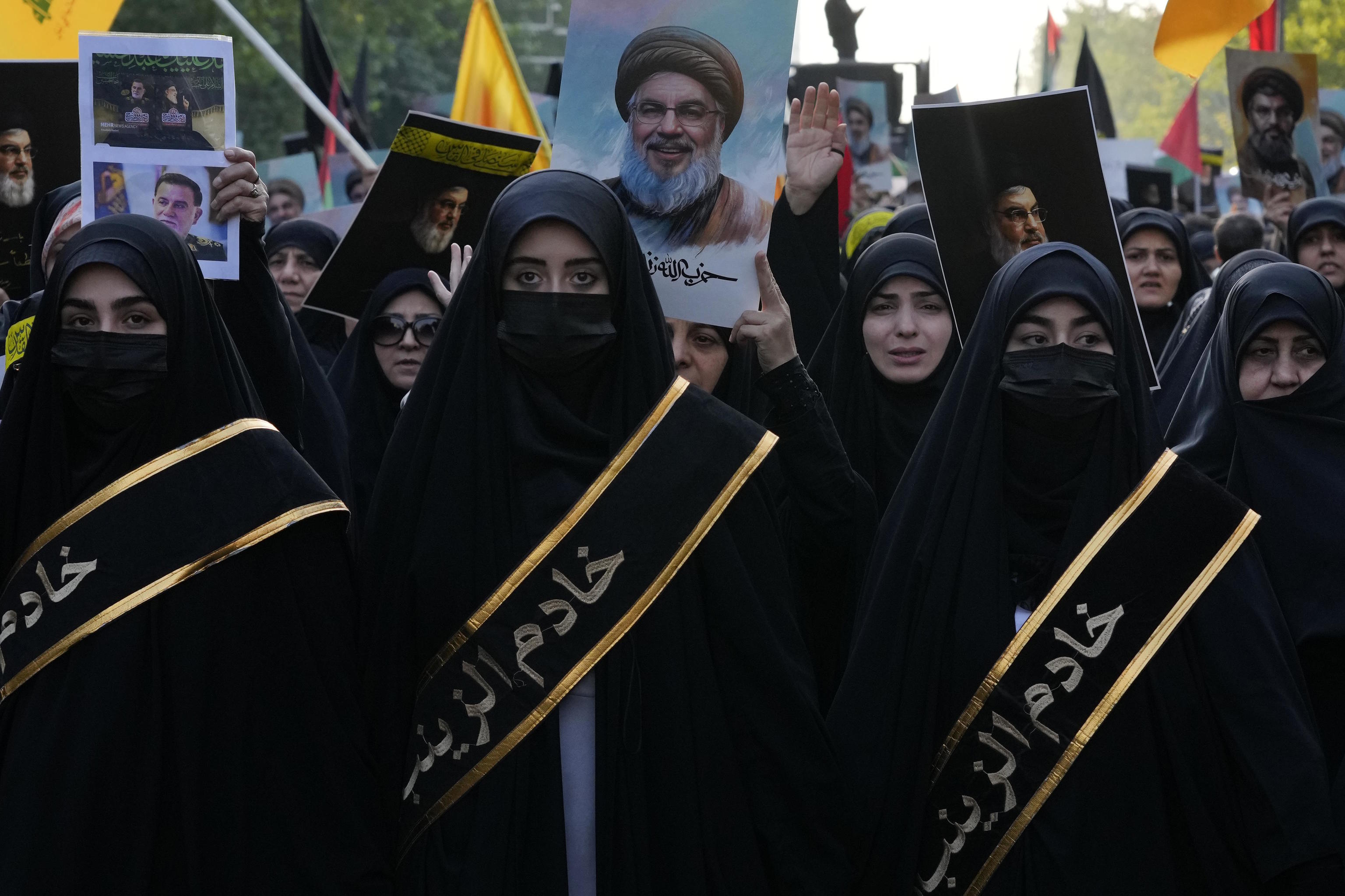 Mourners attend a rally commemorating slain Hezbollah leader Nasrallah.