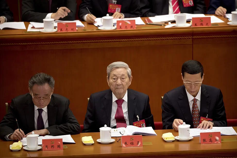 Zhu Rongji, center, sporting gray hair at a party congress.