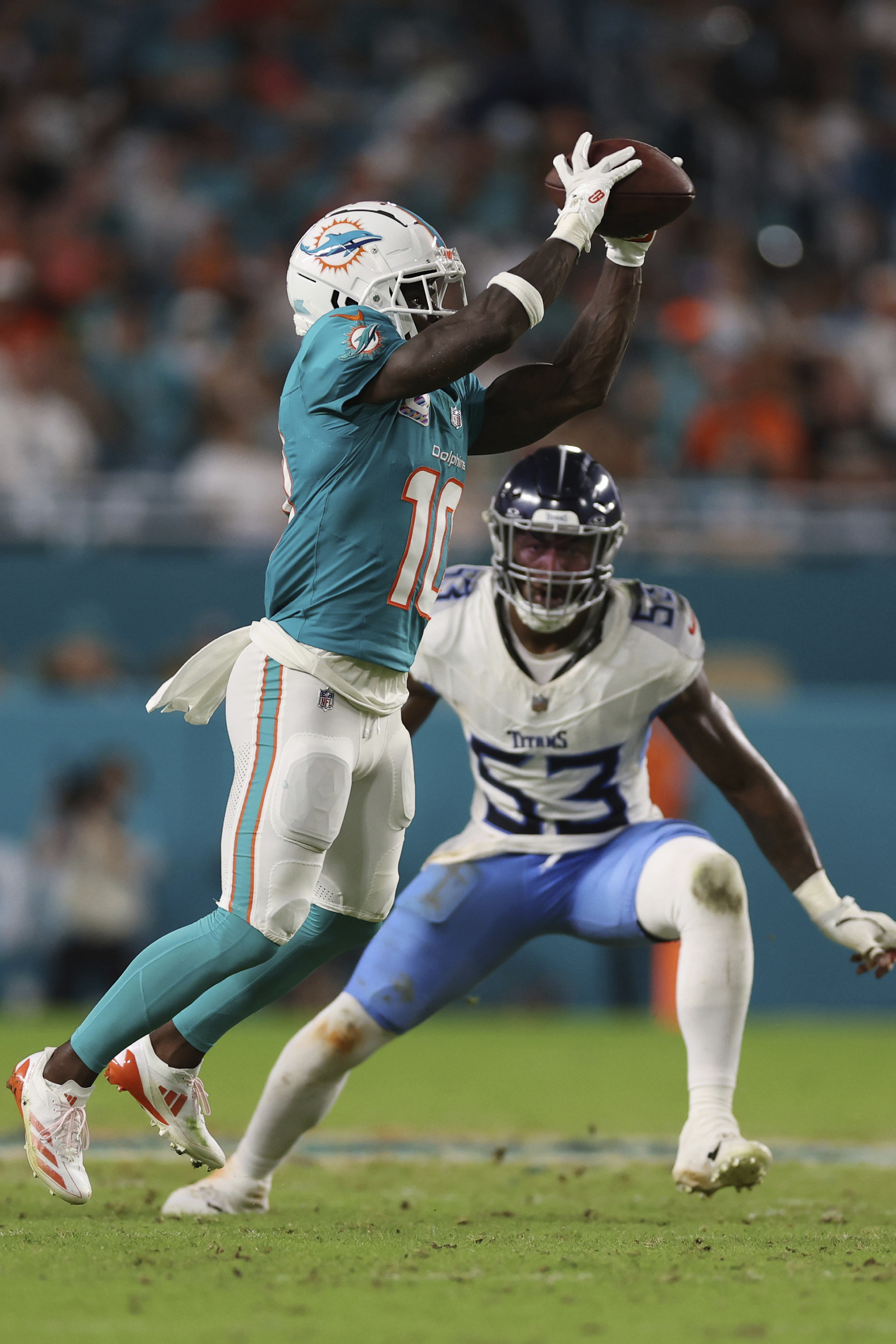 Miami Dolphins wide receiver Tyreek Hill (10) grabs a pass