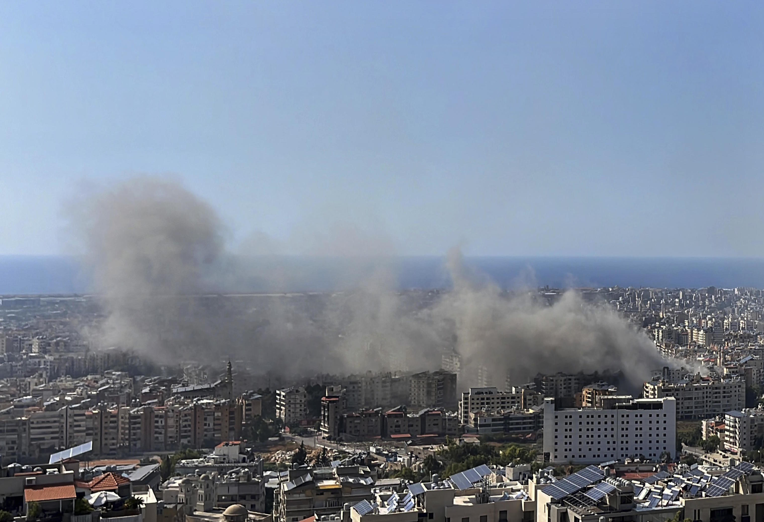 Smoke rises after Israeli airstrikes in Dahiyeh, Beirut.