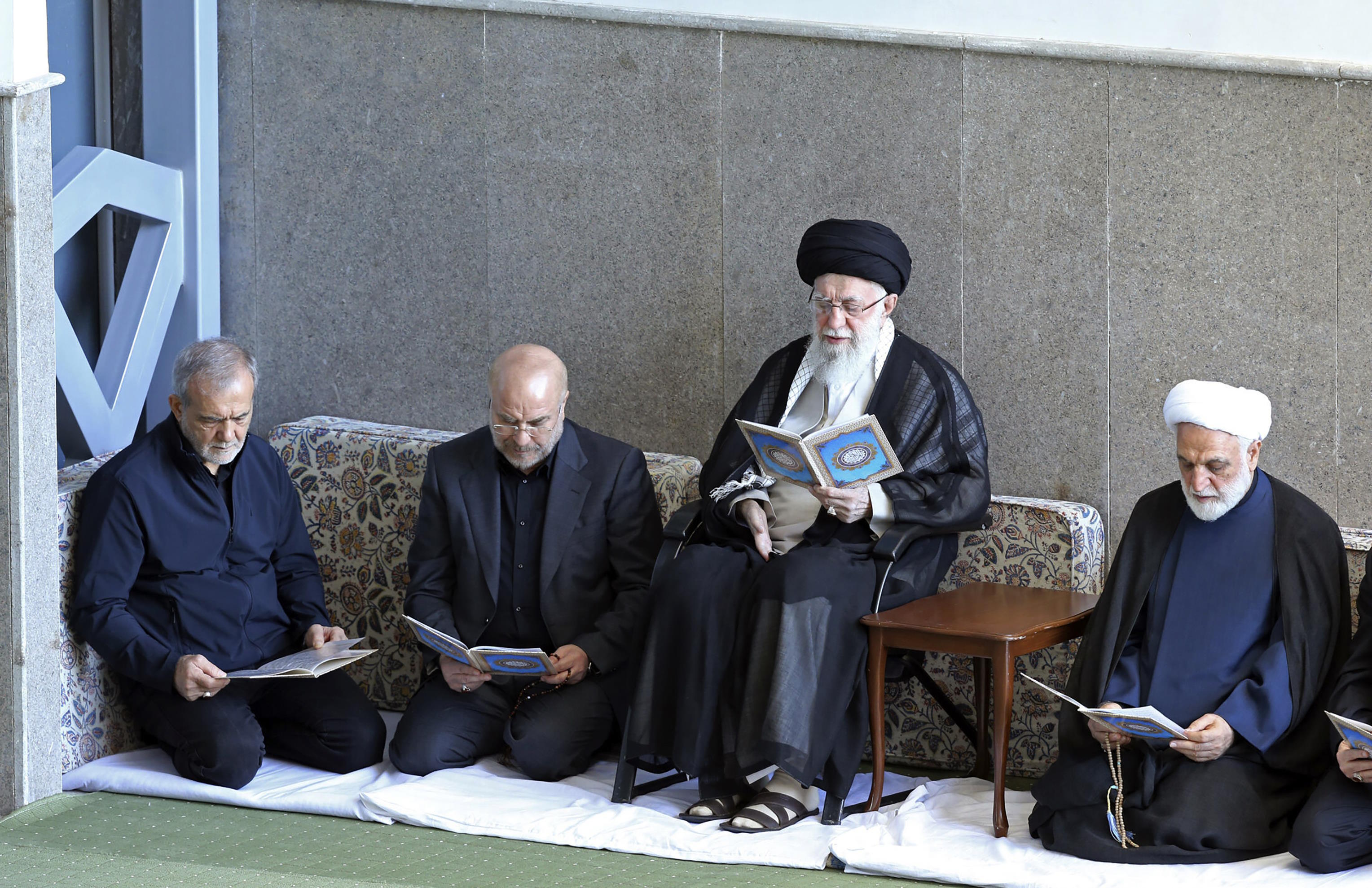 Supreme Leader Ayatollah Ali Khamenei (c).