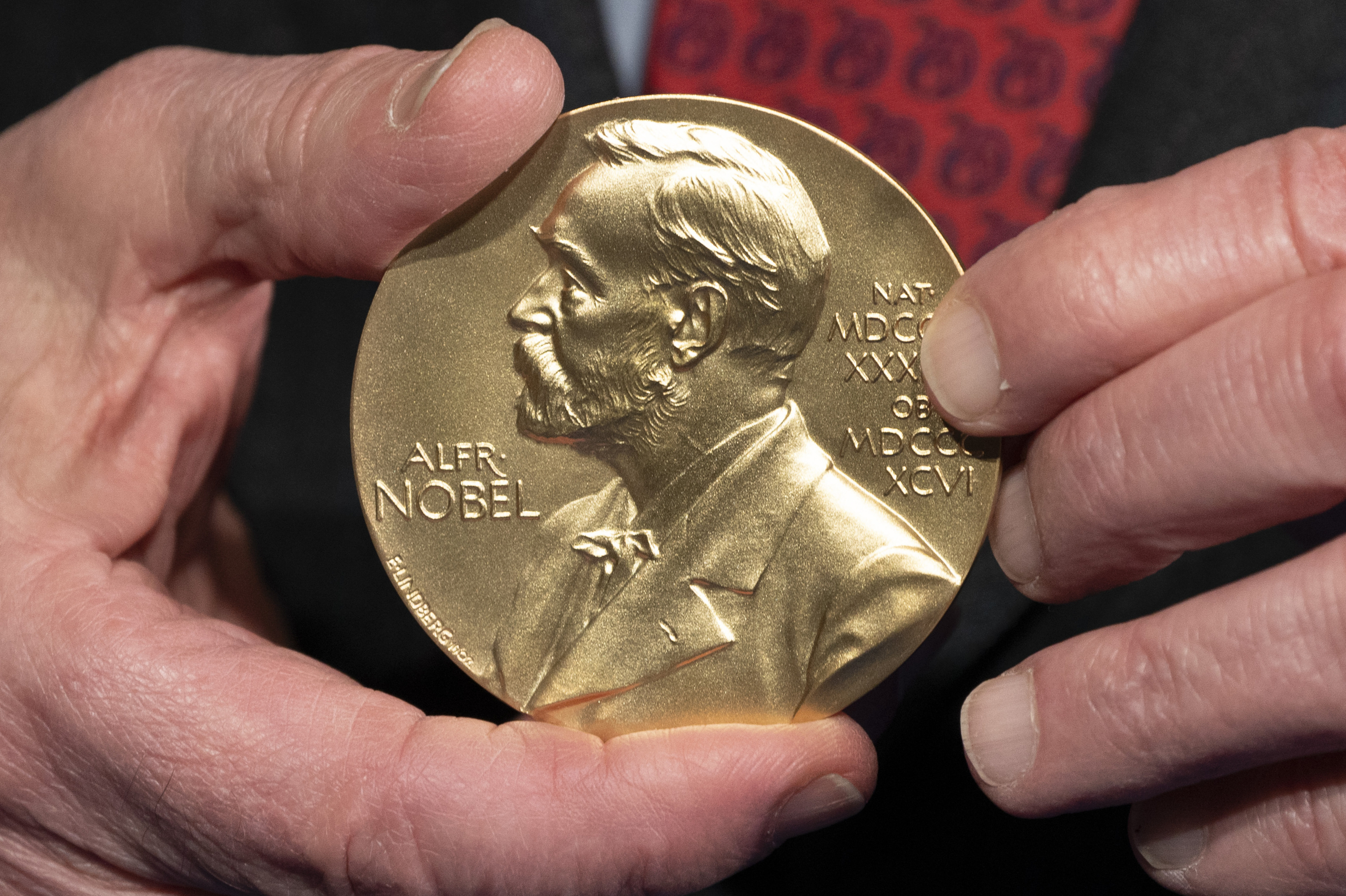 A close-up view of a Nobel Prize medal at the National Institutes of Health