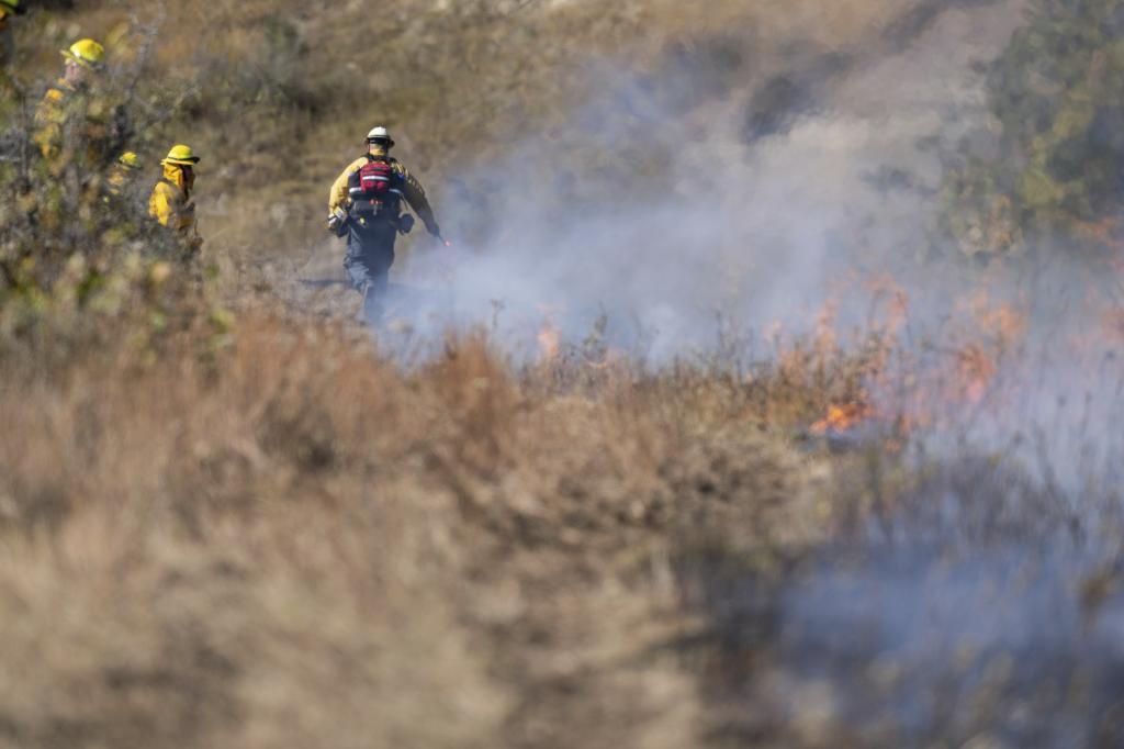 Controlled burn to prevent the further spread of a wildfire in Mandaree.