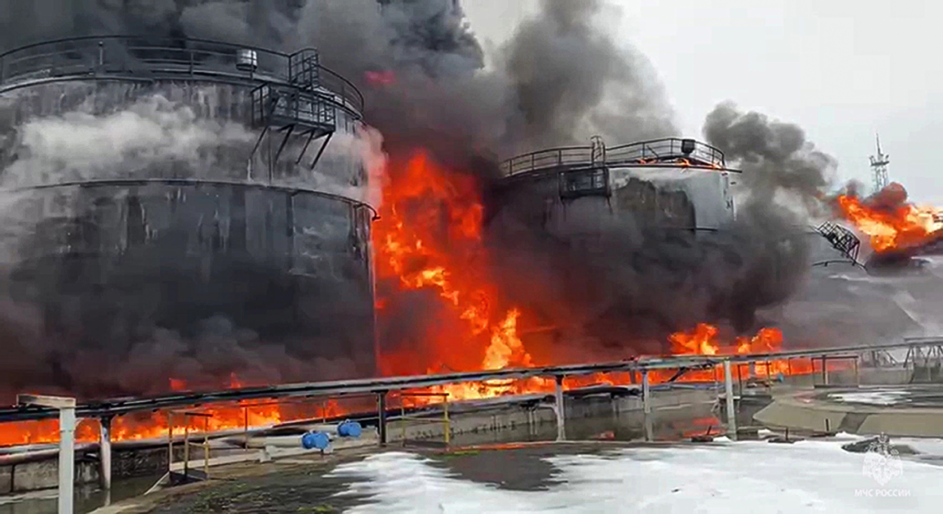 Oil tanks are seen on fire after the drone attack in Klintsy, a city in Russia's Bryansk region