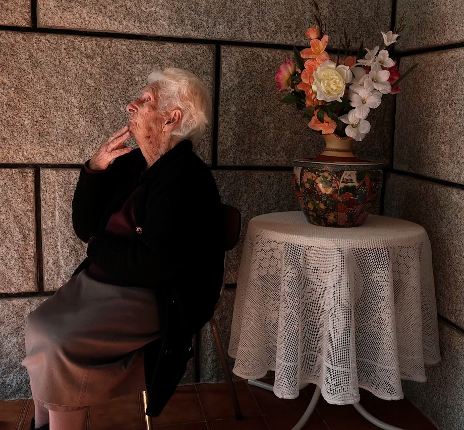 105-year-old Mara Dora Vzquez poses at the door of her son's house in Orense, Spain.