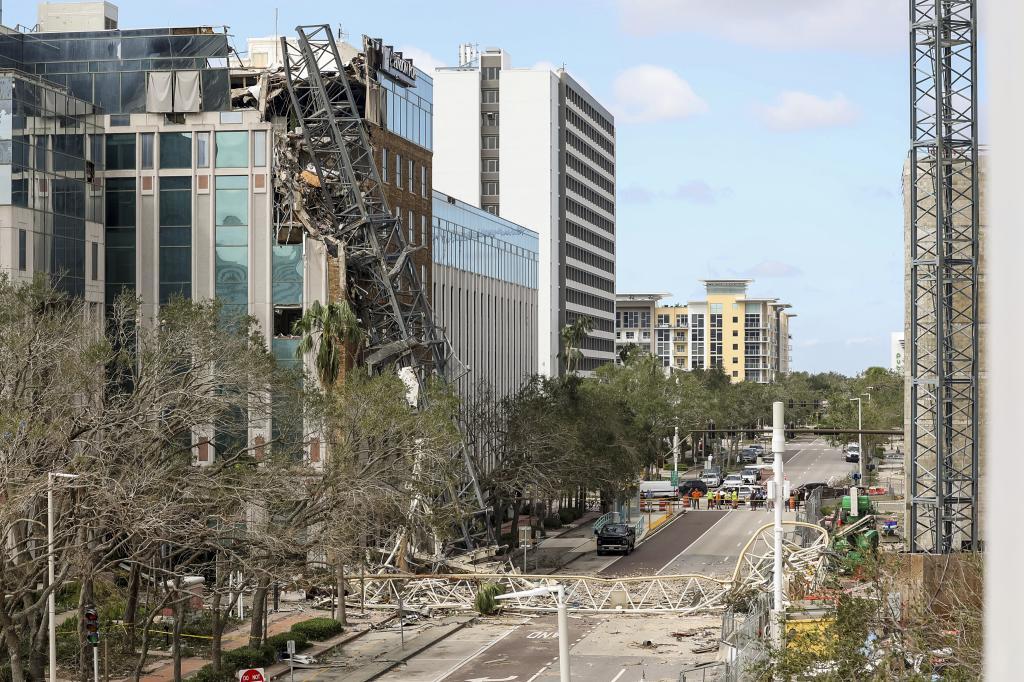 A high rise construction crane broke apart and crashed into the building across the street during Hurricane Milton
