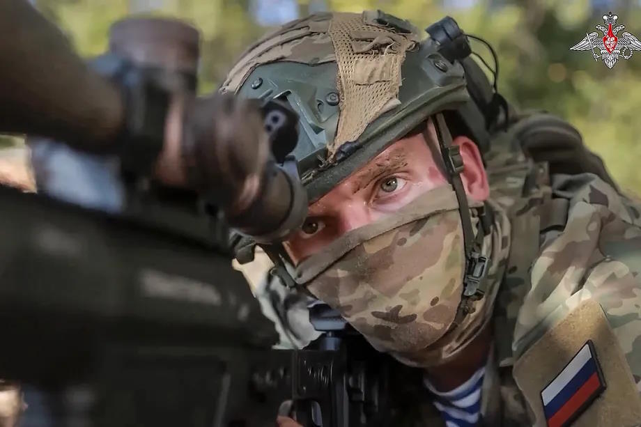 A sniper fires at Ukrainian forces.