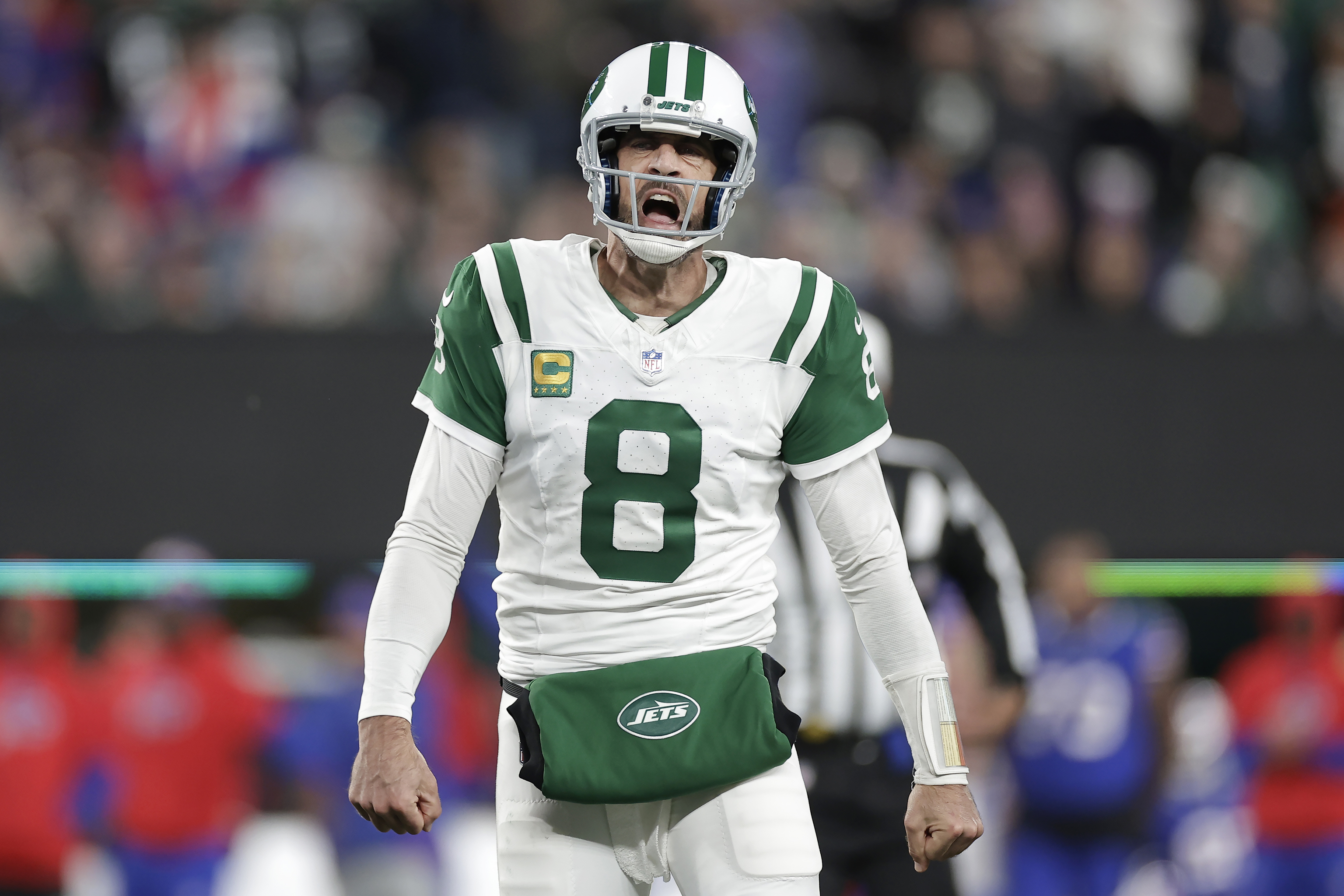 New York Jets quarterback Aaron Rodgers (8) reacts during the second half of an NFL football game against the Buffalo Bills.