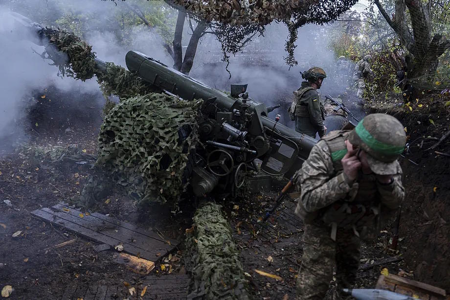 Ukrainian military forces fire towards Russian positions in the Kharkiv region.