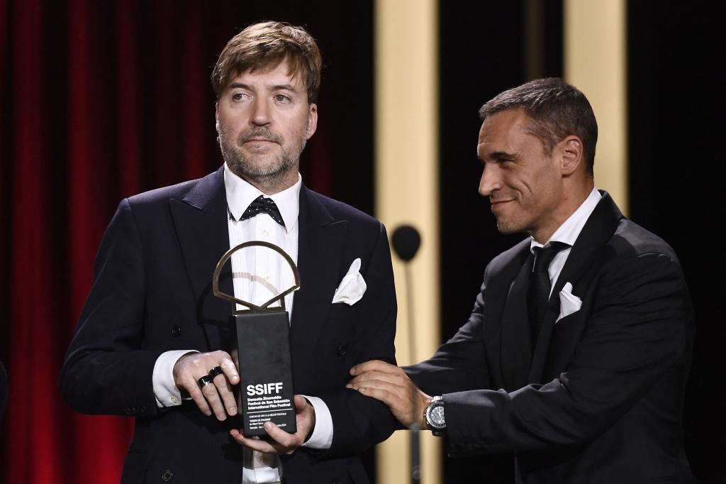 Spanish director Albert Serra receives the Golden Shell for best film award.