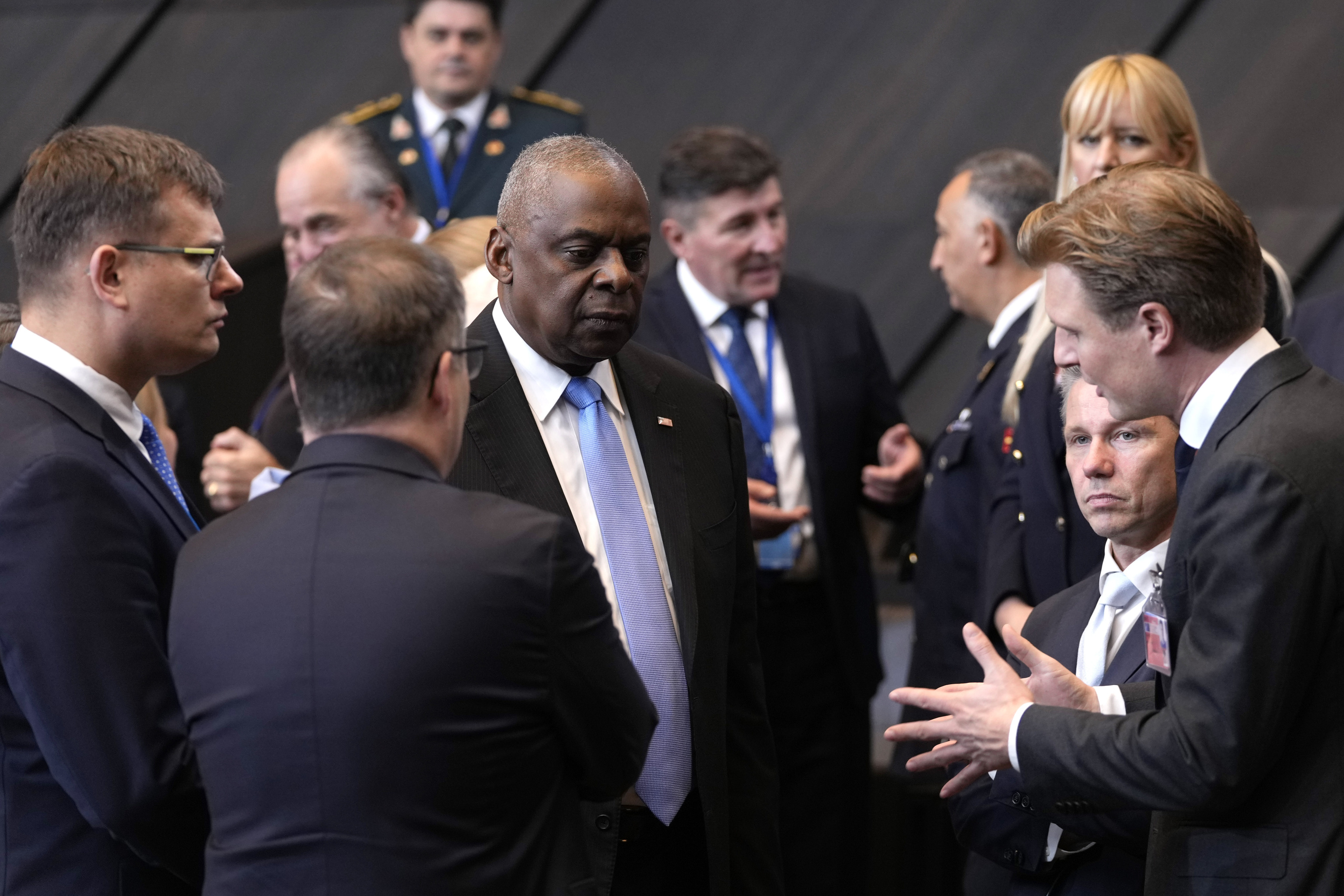 United States Secretary of Defense Lloyd Austin, center, speaks with Netherland's Defense Minister Ruben Brekelmans, right, and Sweden's Defense Minister Pal Jonson, third right.