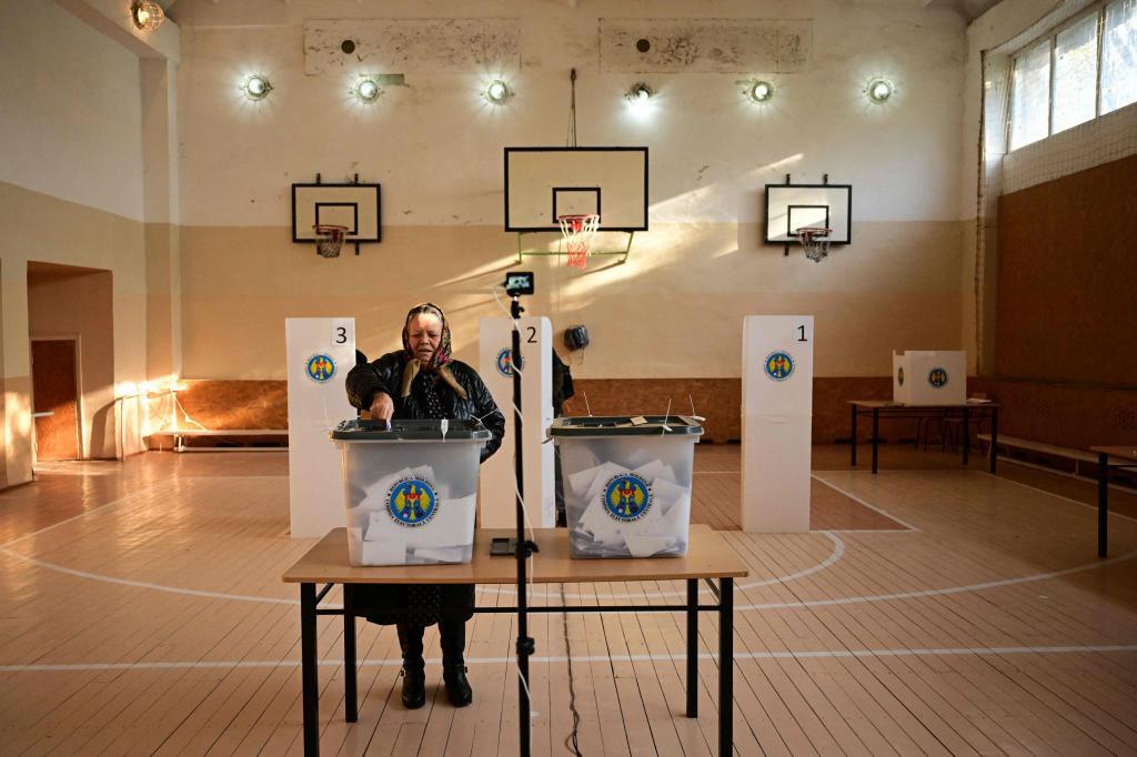 A woman casts her ballots on joining the European Union.