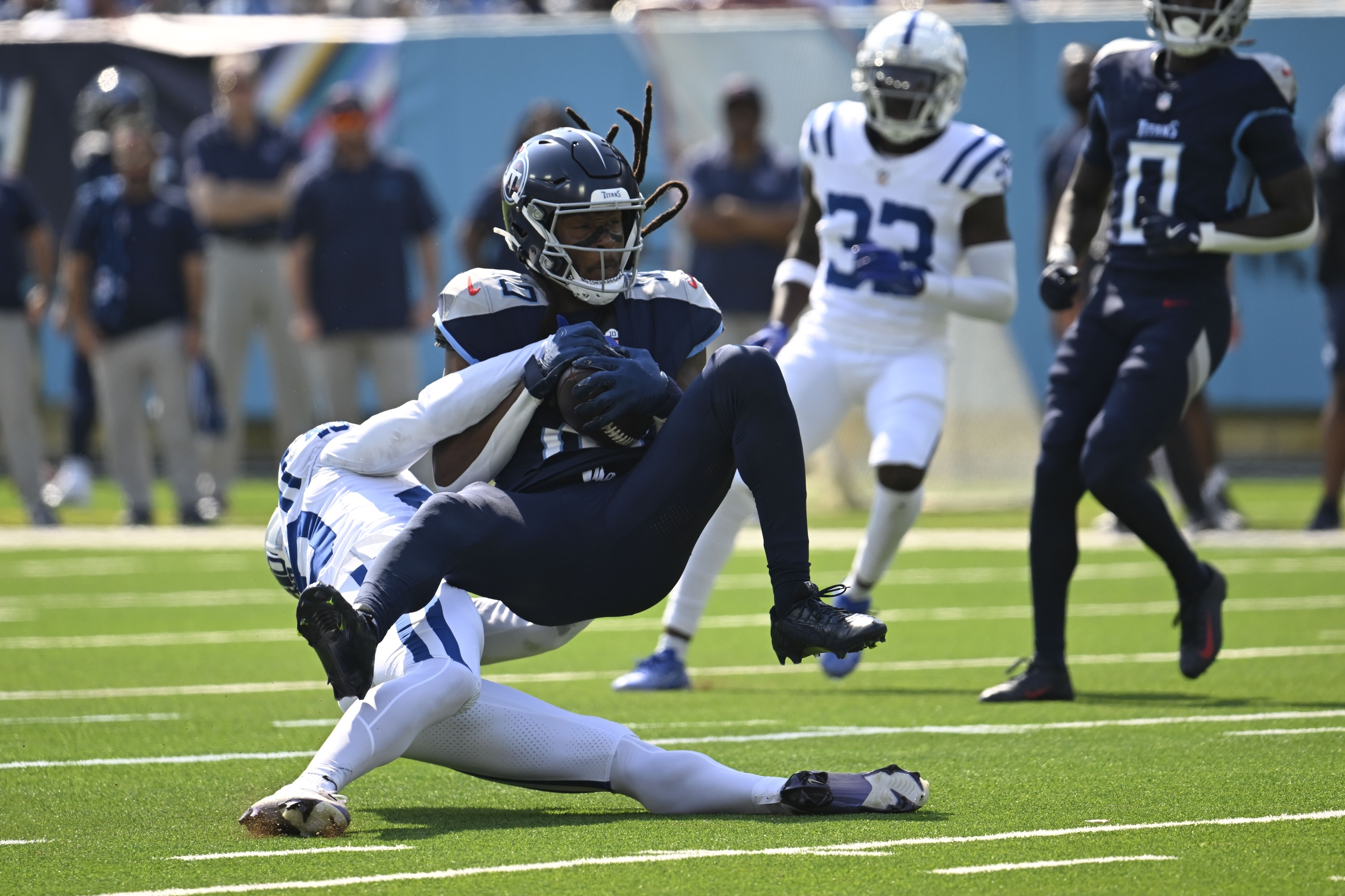 Tennessee Titans' DeAndre Hopkins (10) makes a catch against Indianapolis Colts' Jaylon Jones (40).