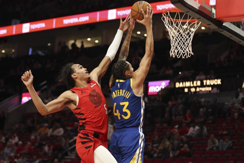 Portland Trail Blazers guard Dalano Banton (5) defends against Golden State Warriors forward Lindy Waters III (43)