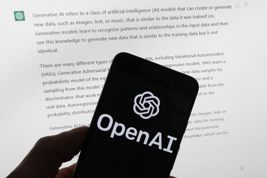 The OpenAI logo is seen on a mobile phone