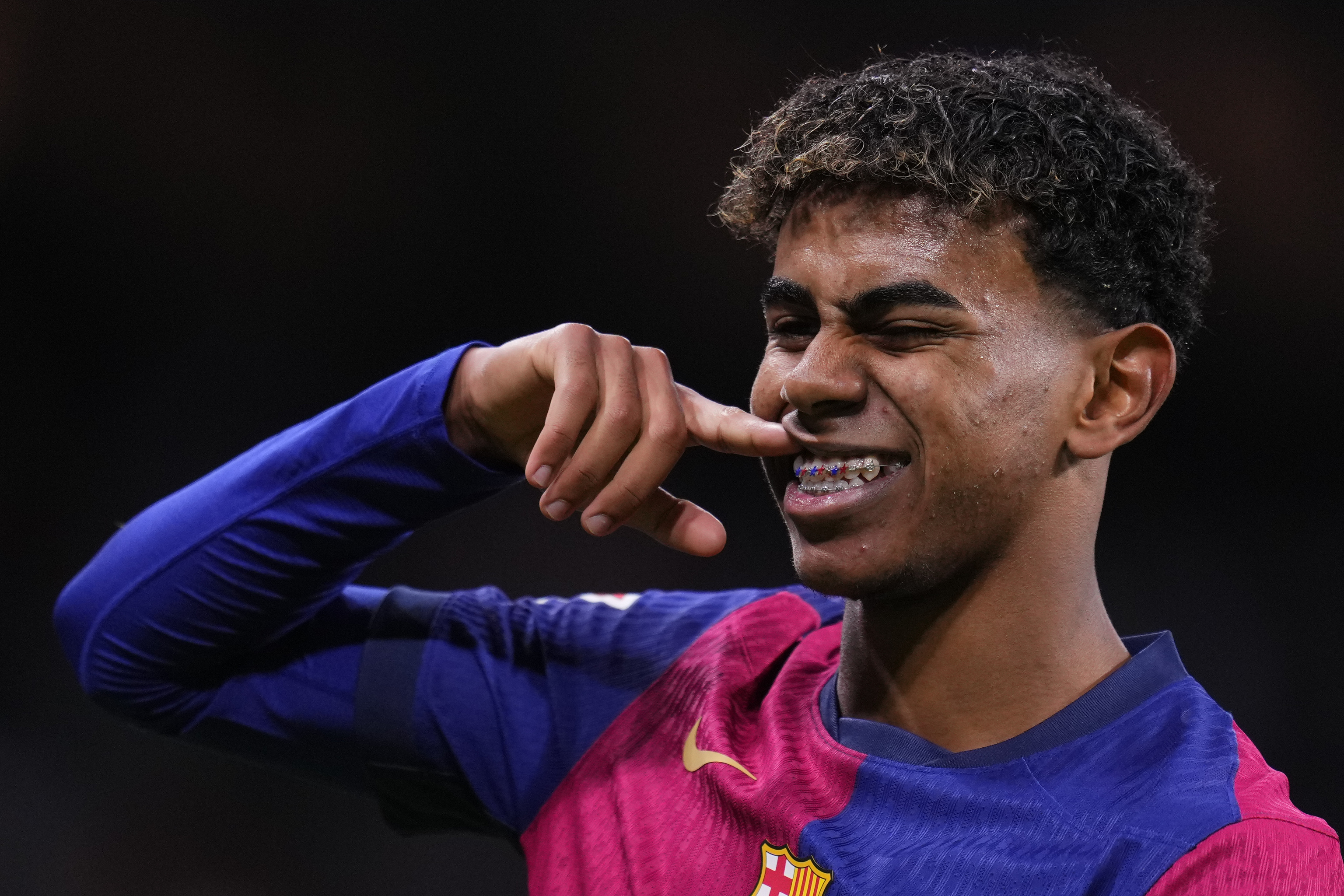 Barcelona's Lamine Yamal celebrates  at the Santiago Bernabeu stadium.