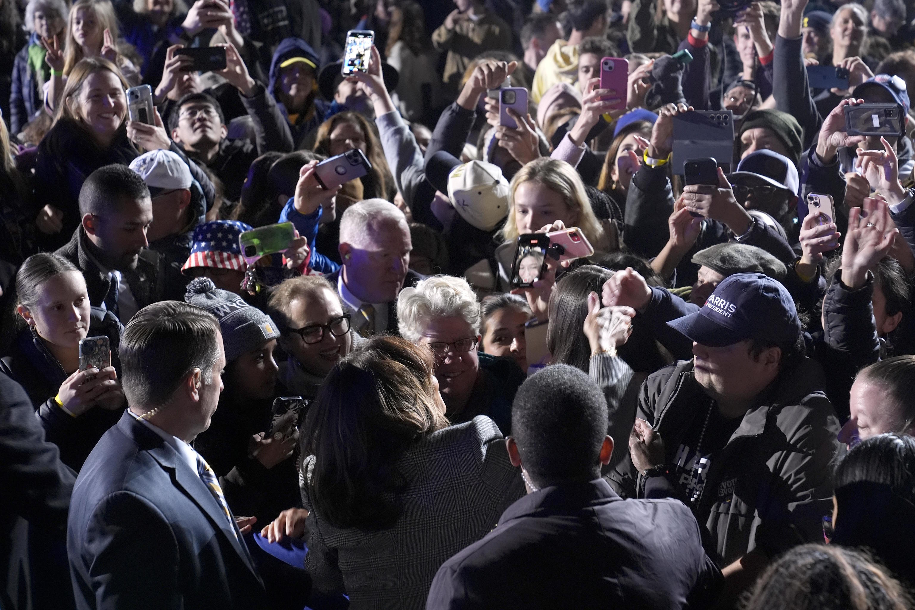 Kamala Harris greets supporters after speaking at a campaign event.