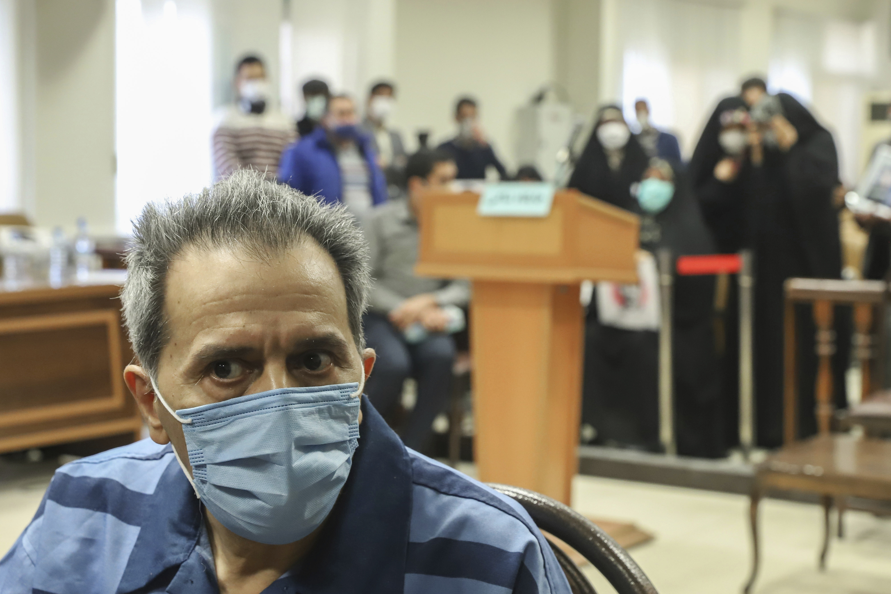 Iranian-German national and U.S. resident Jamshid Sharmahd attends his trial at the Revolutionary Court