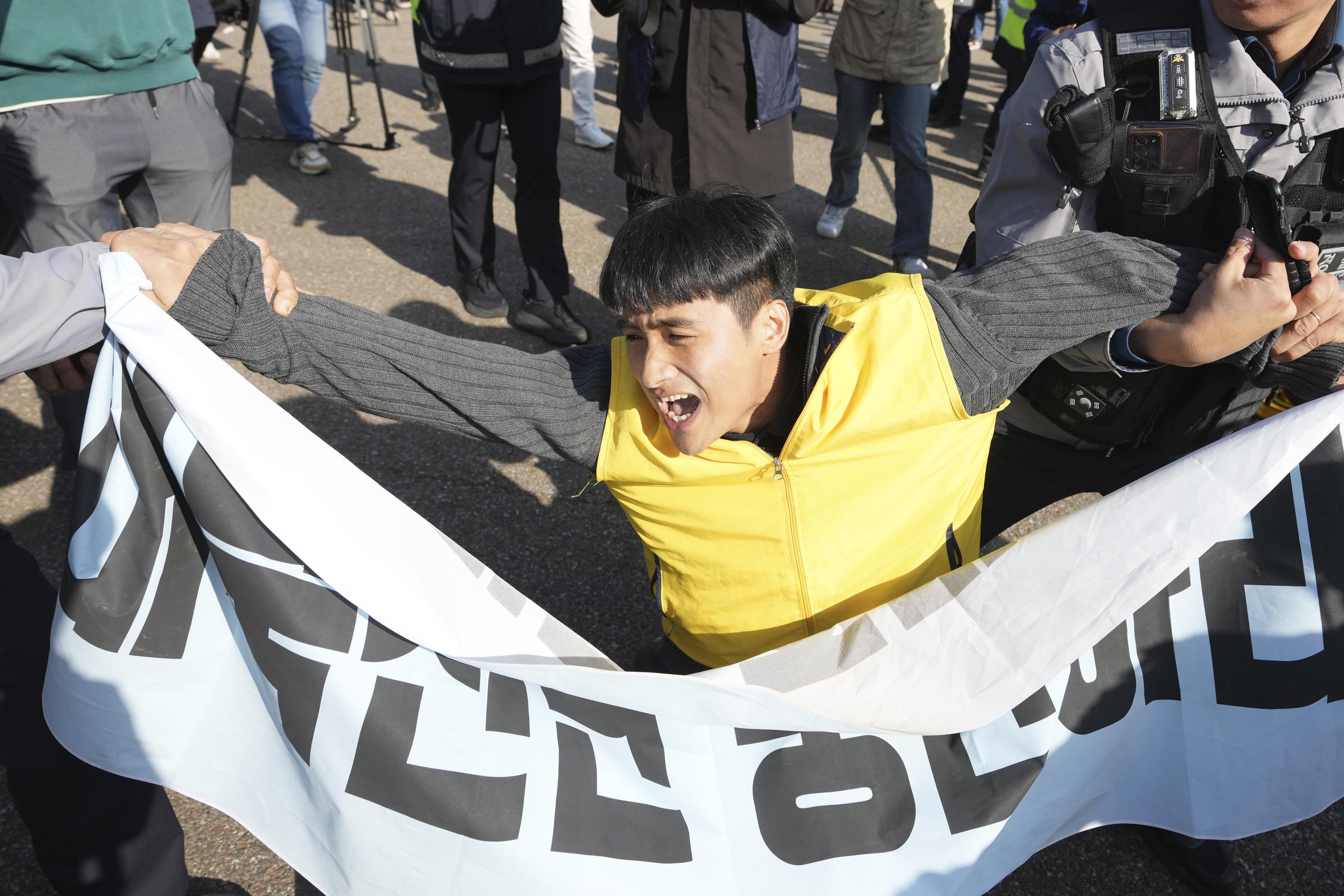 A man want to stop the launch of balloons carrying leaflets into North Korea.