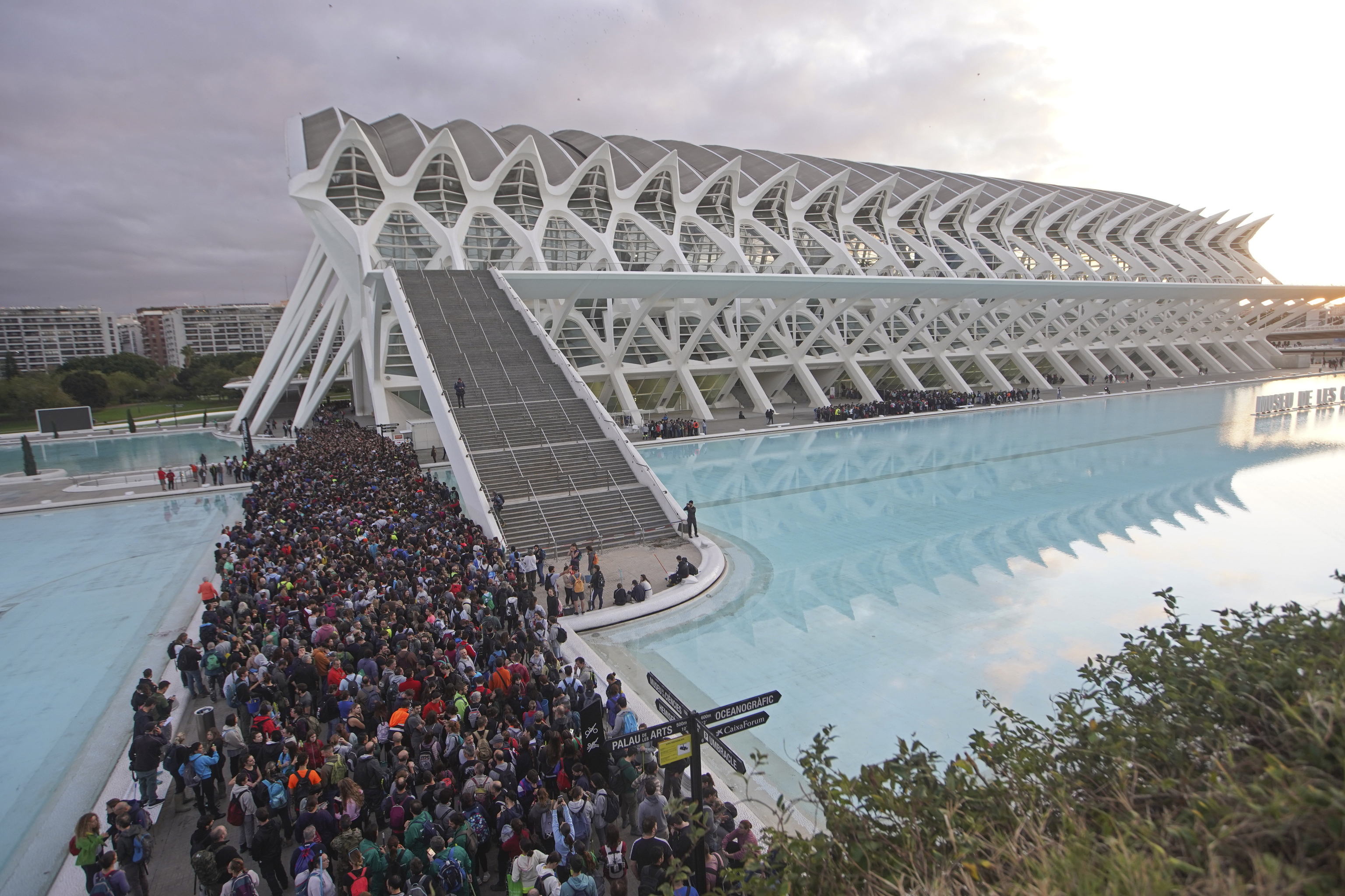 Thousands of volunteers show up at the City of Arts and Sciences cultural complex to be assigned work schedules to help with the clean up operation after floods in Valencia, Spain.