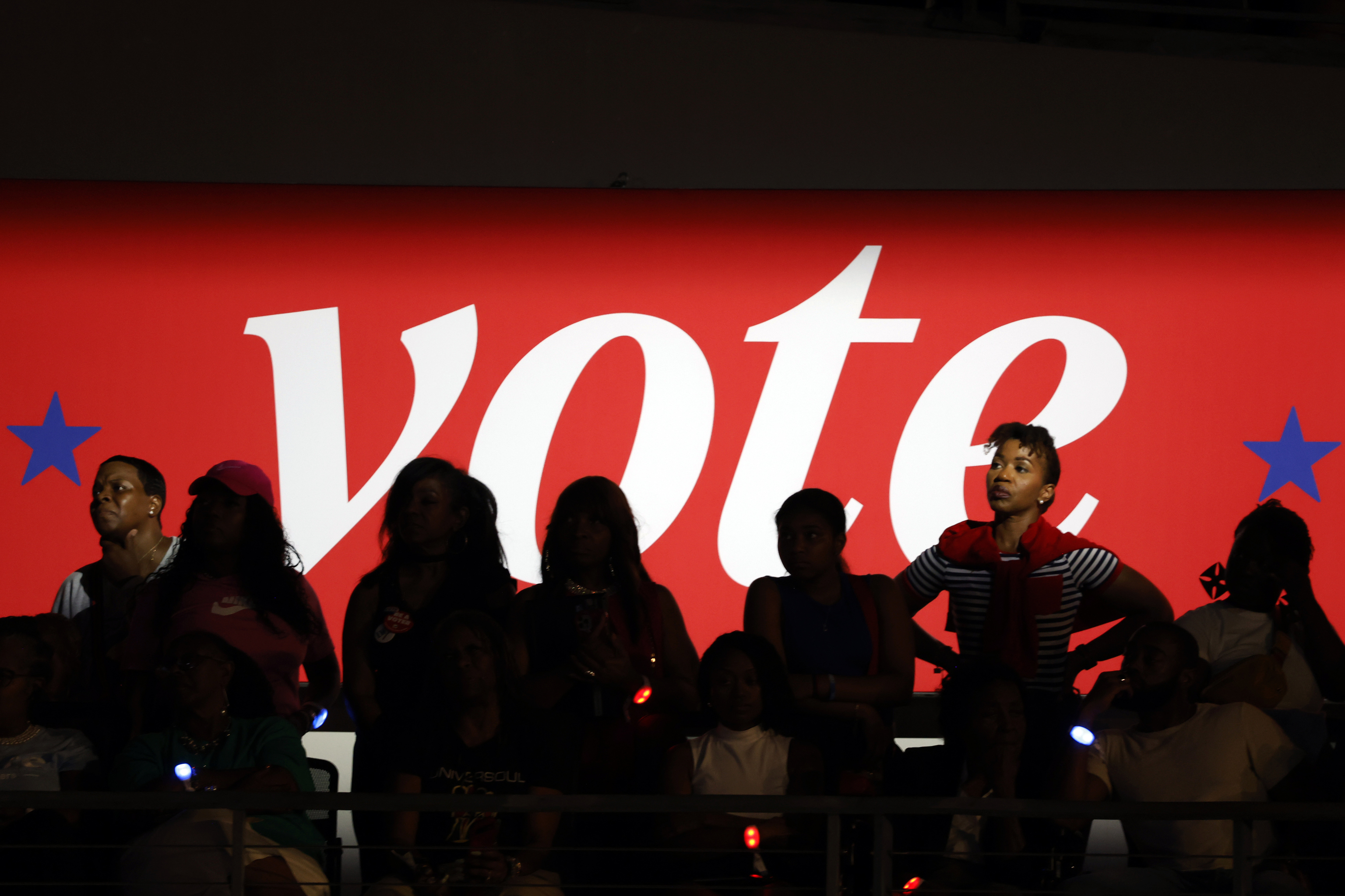 Attendees look on at a campaign rally for Democratic presidential nominee Vice President Kamala Harris.