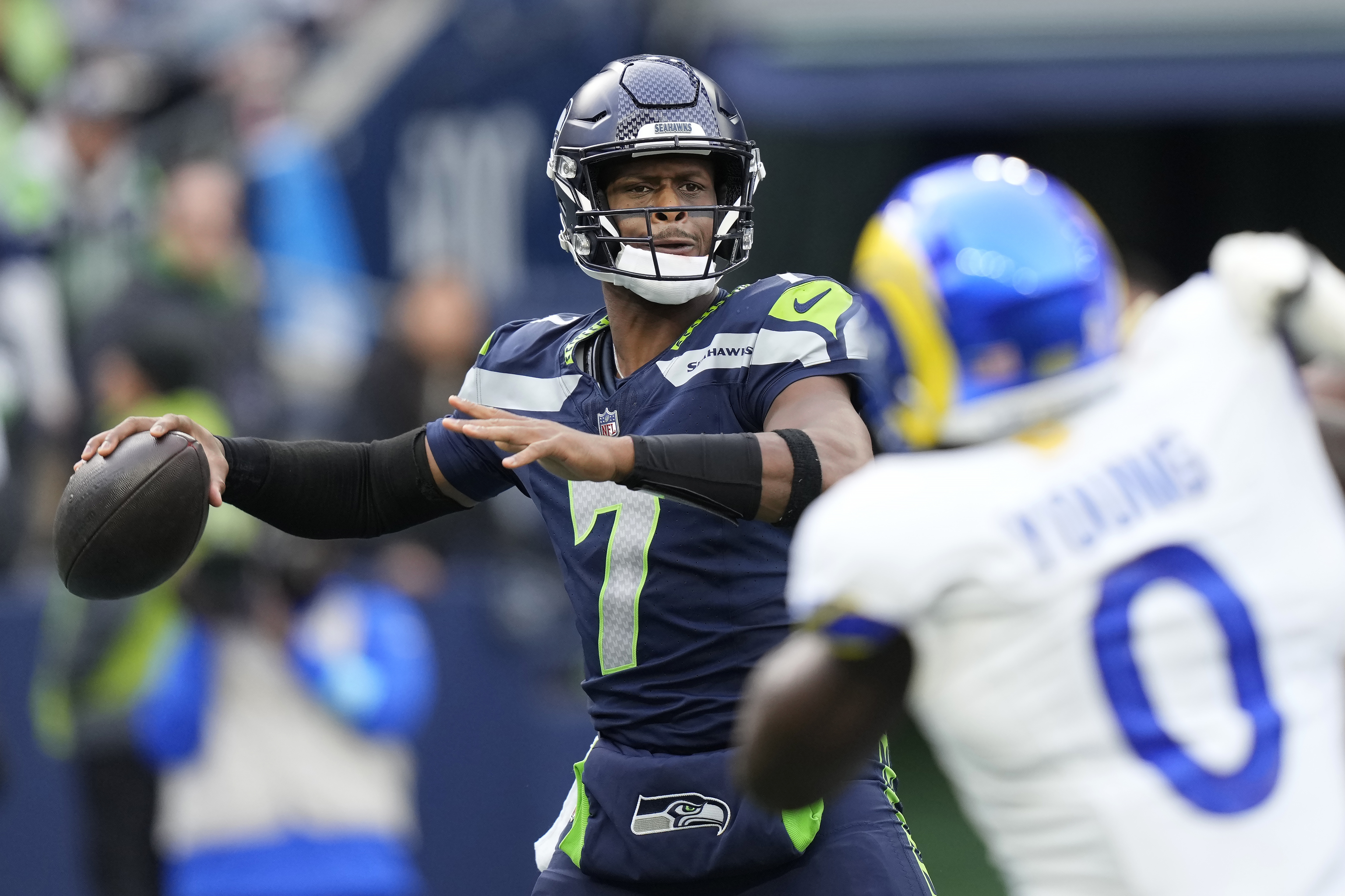 Seattle Seahawks quarterback Geno Smith (7) passes against the Los Angeles Rams.