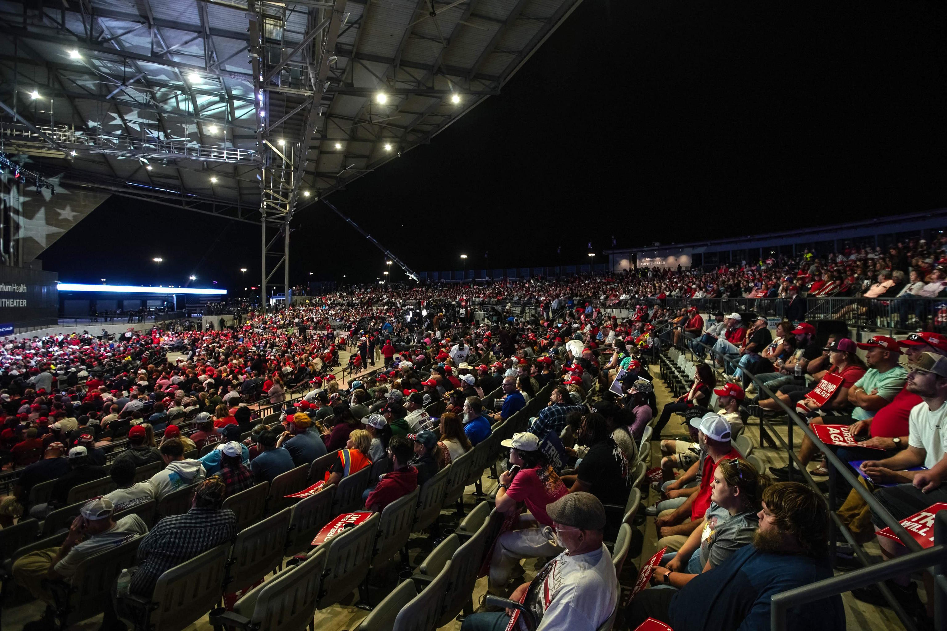 Supporters listen to Donald Trump speak during a campaign rally in Georgia.