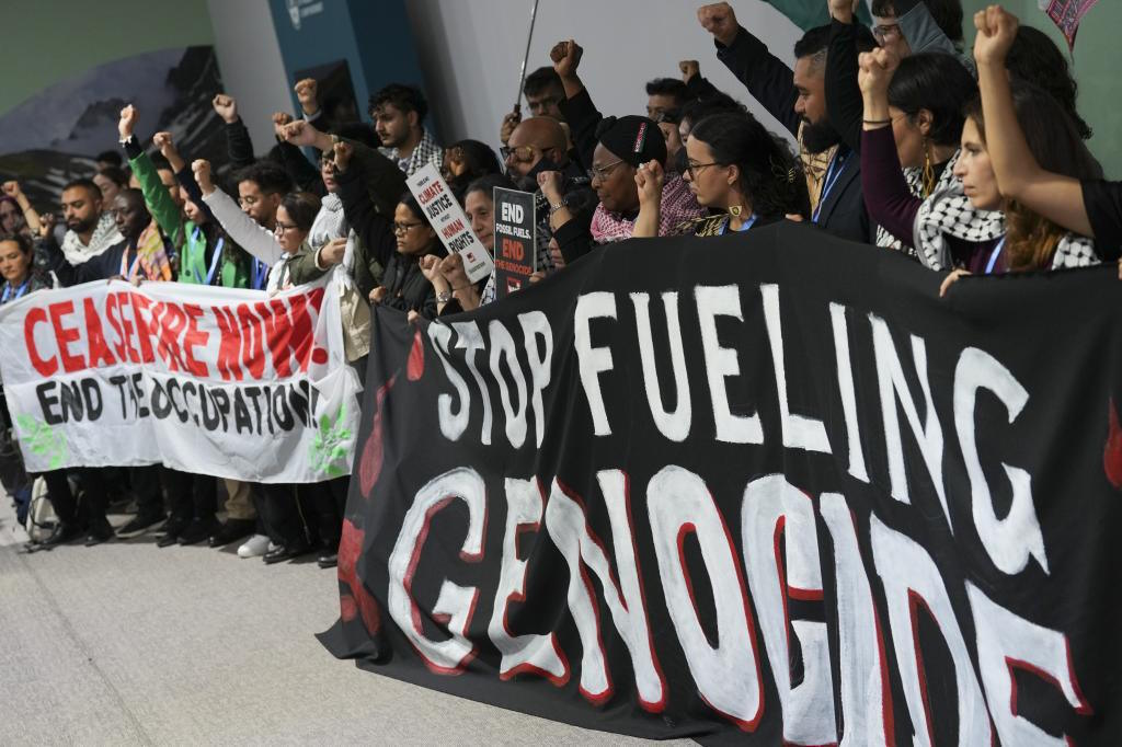 Activists demonstrate for climate justice and a ceasefire in the Israel-Hamas.
