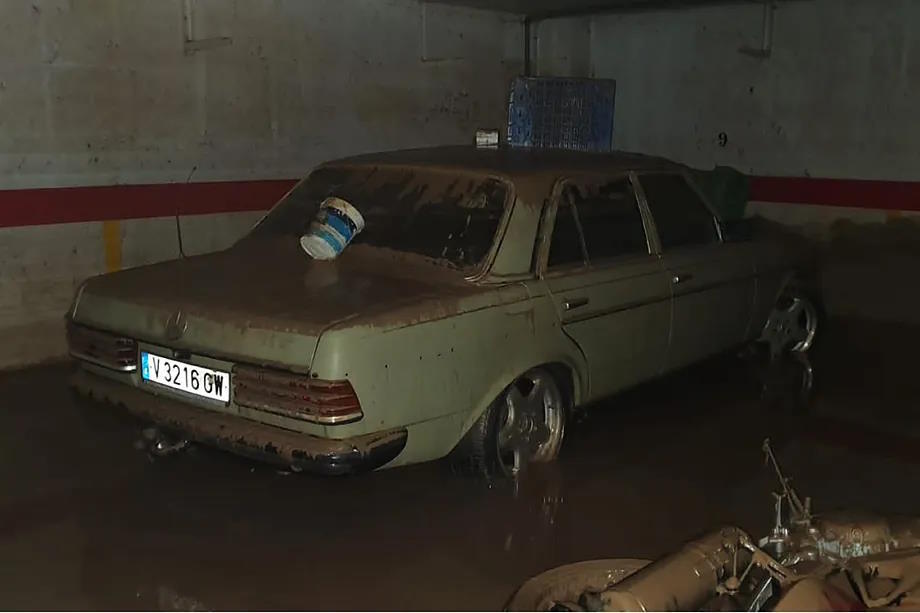 The Mercedes after draining the garage of water and mud.