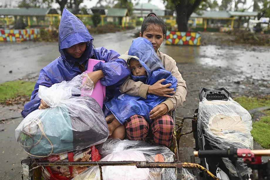 Residents of Santa Ana, Cagayan province, are heading to an evacuation center.