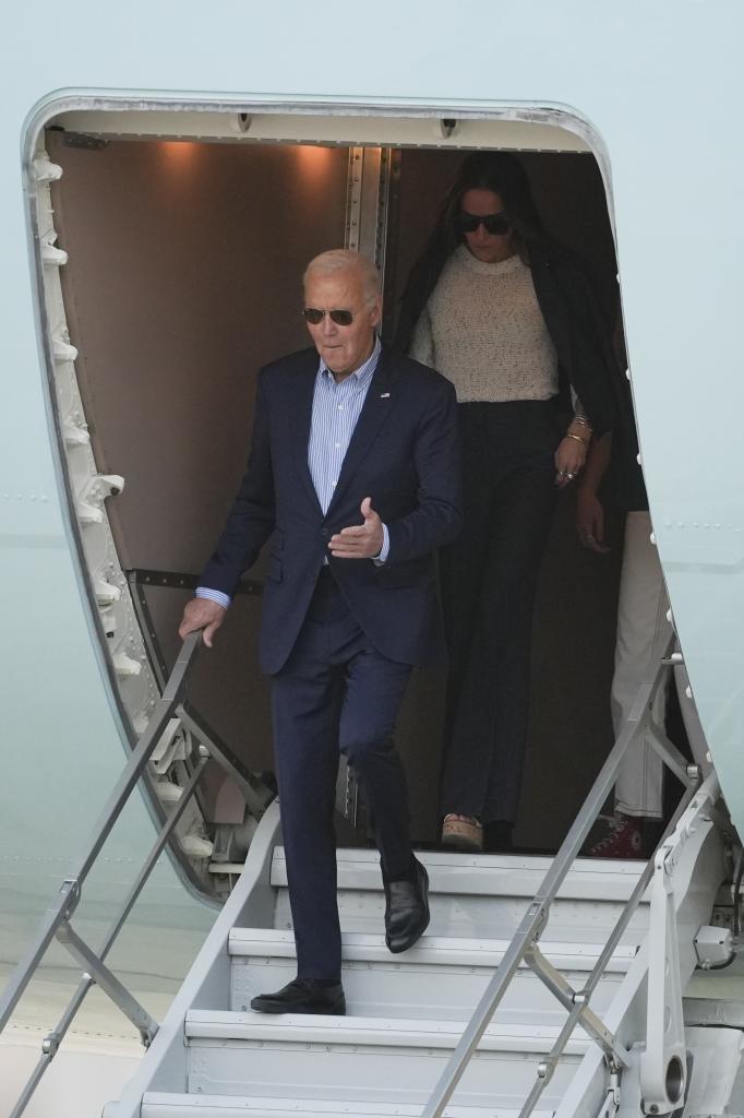 U.S. President Joe Biden deplanes in Lima