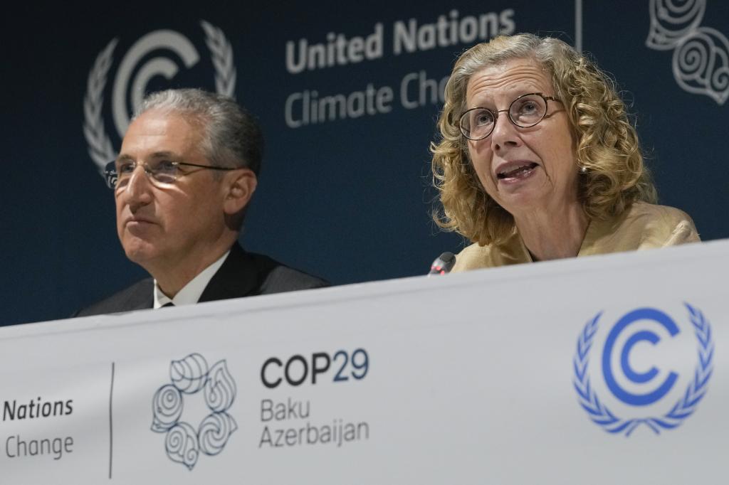 Inger Andersen, Executive Director UNEP, right, speaks during a session next to Mukhtar Babayev, COP29 President, at the COP29 U.N. Climate Summit