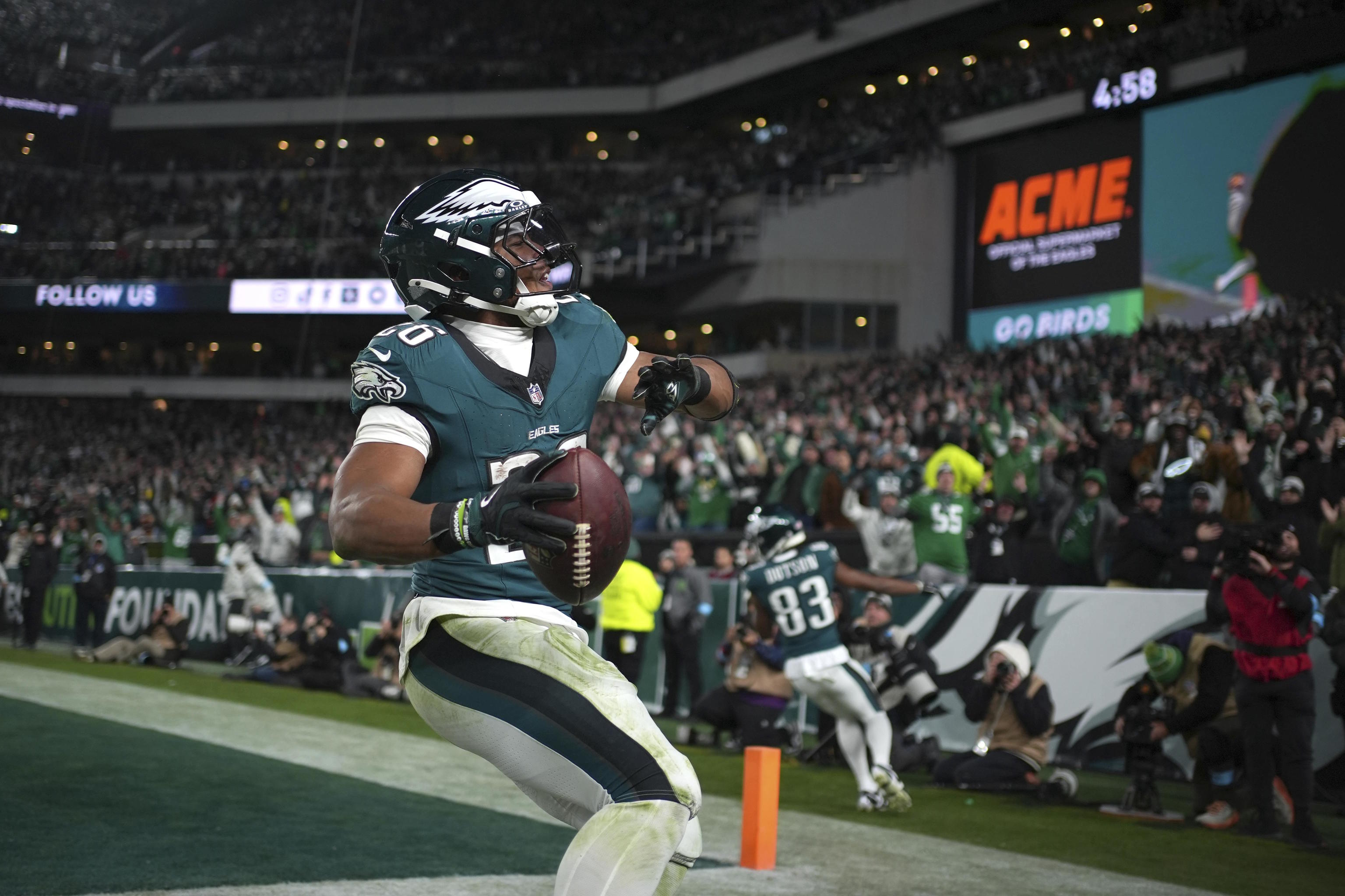 Philadelphia Eagles running back Saquon Barkley celebrates after scoring.