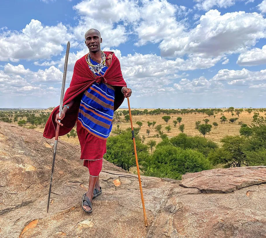 A Maasai on the rocks of Togoro Plains.