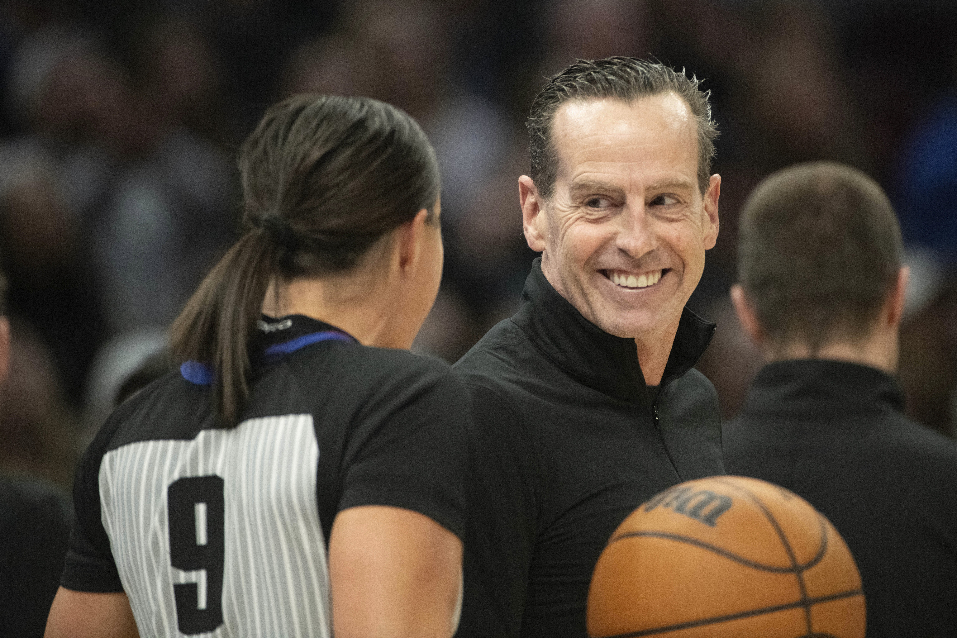 Cleveland Cavaliers head coach Kenny Atkinson, right, speaks with referee Natalie Sago (9).