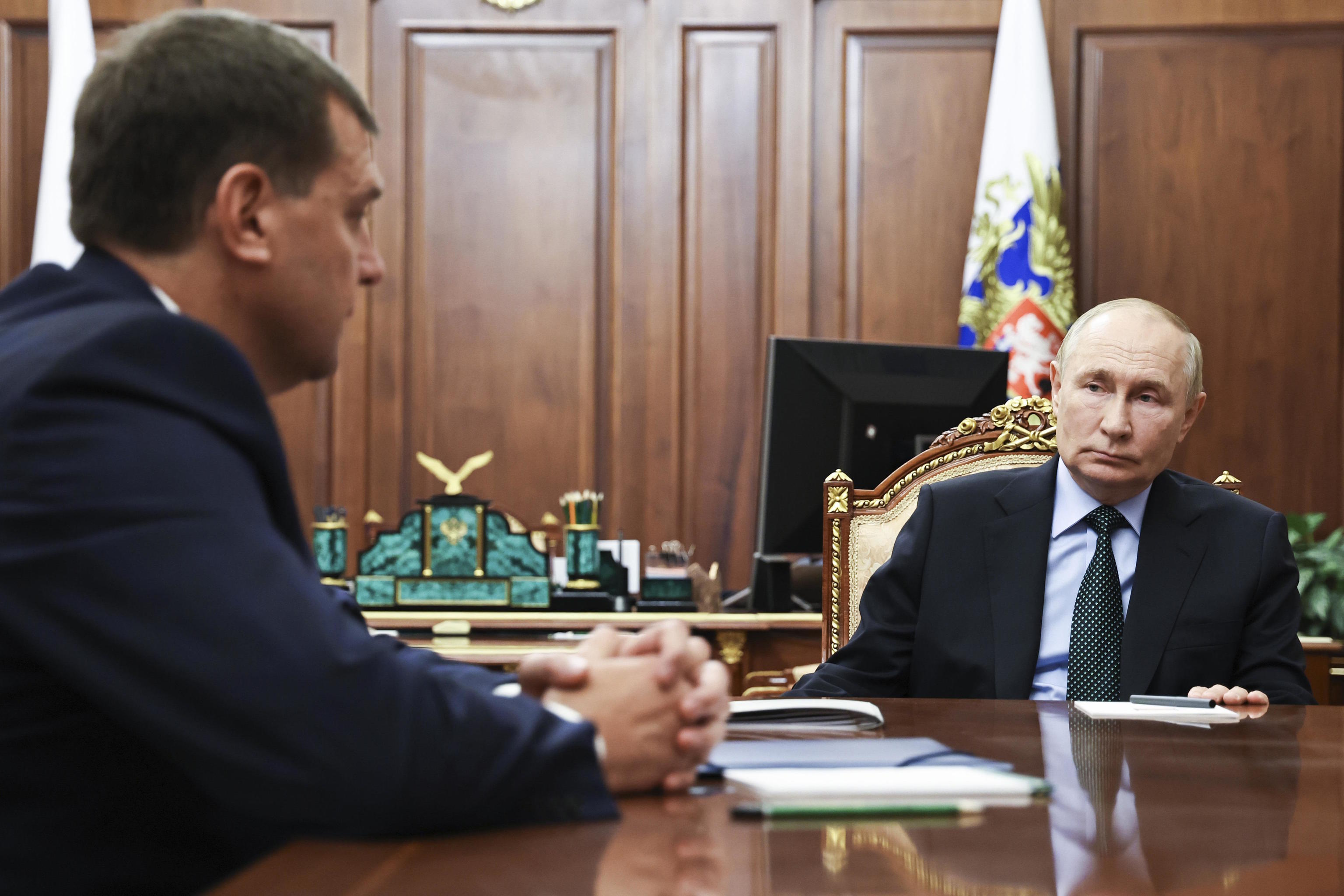 Putin listens to Moscow-appointed head, Balitsky.