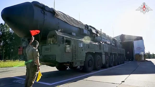 A Russian ballistic missile launcher RS-24 Yars leaves a hangar during a drill.