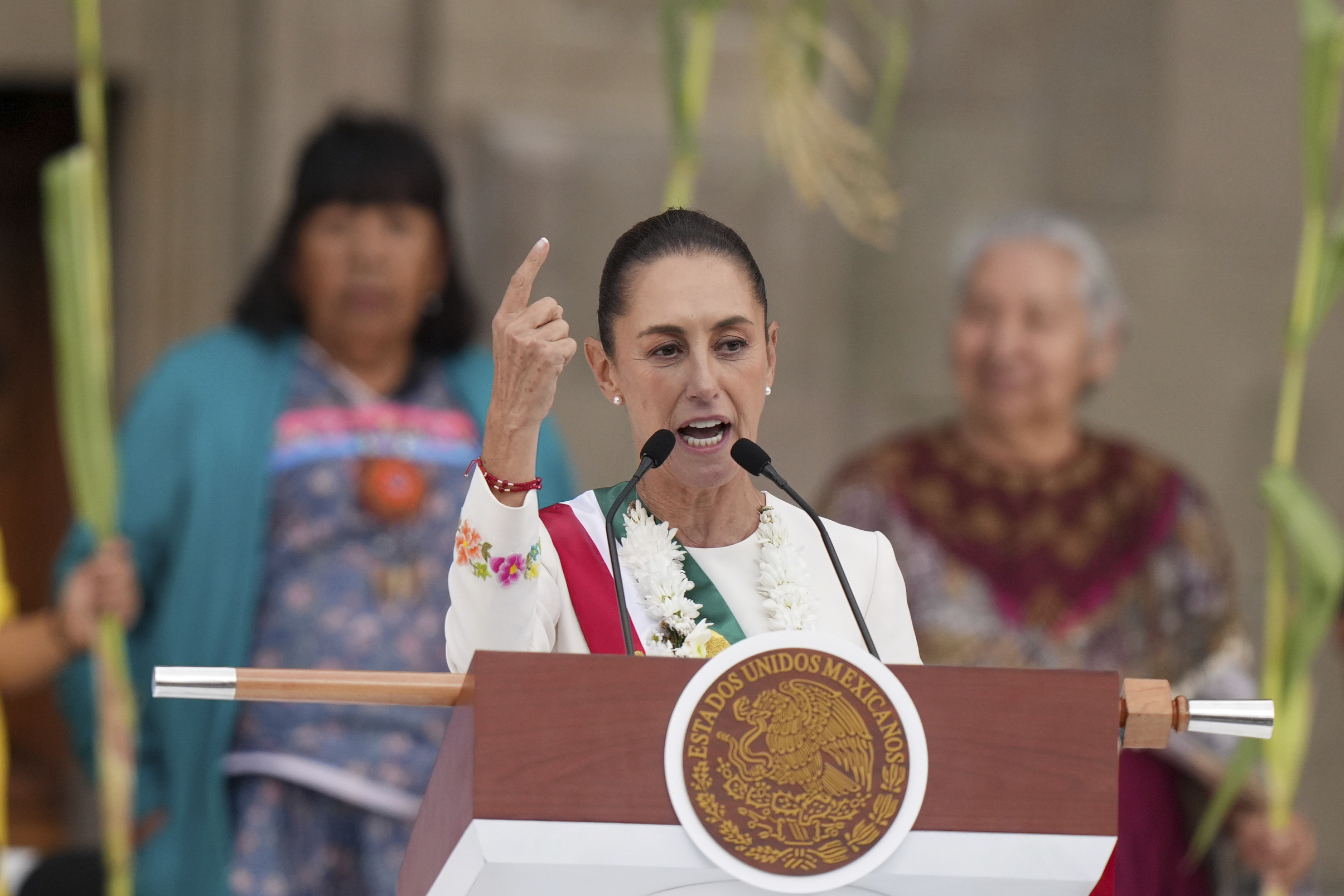 Newly-sworn in President Claudia Sheinbaum addresses supporters in the Zcalo, Mexico.