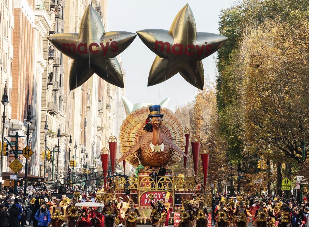 The Tom Turkey float leads the way down Central Park West during the Macy's Thanksgiving Day Parade