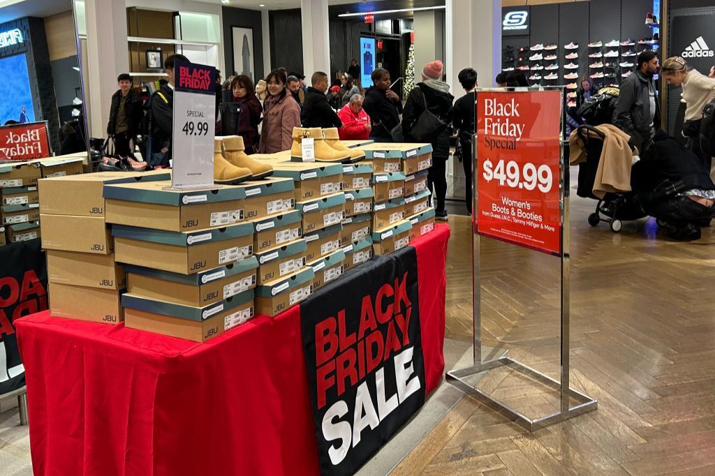 Items on sale for Black Friday are displayed at Macy's department store