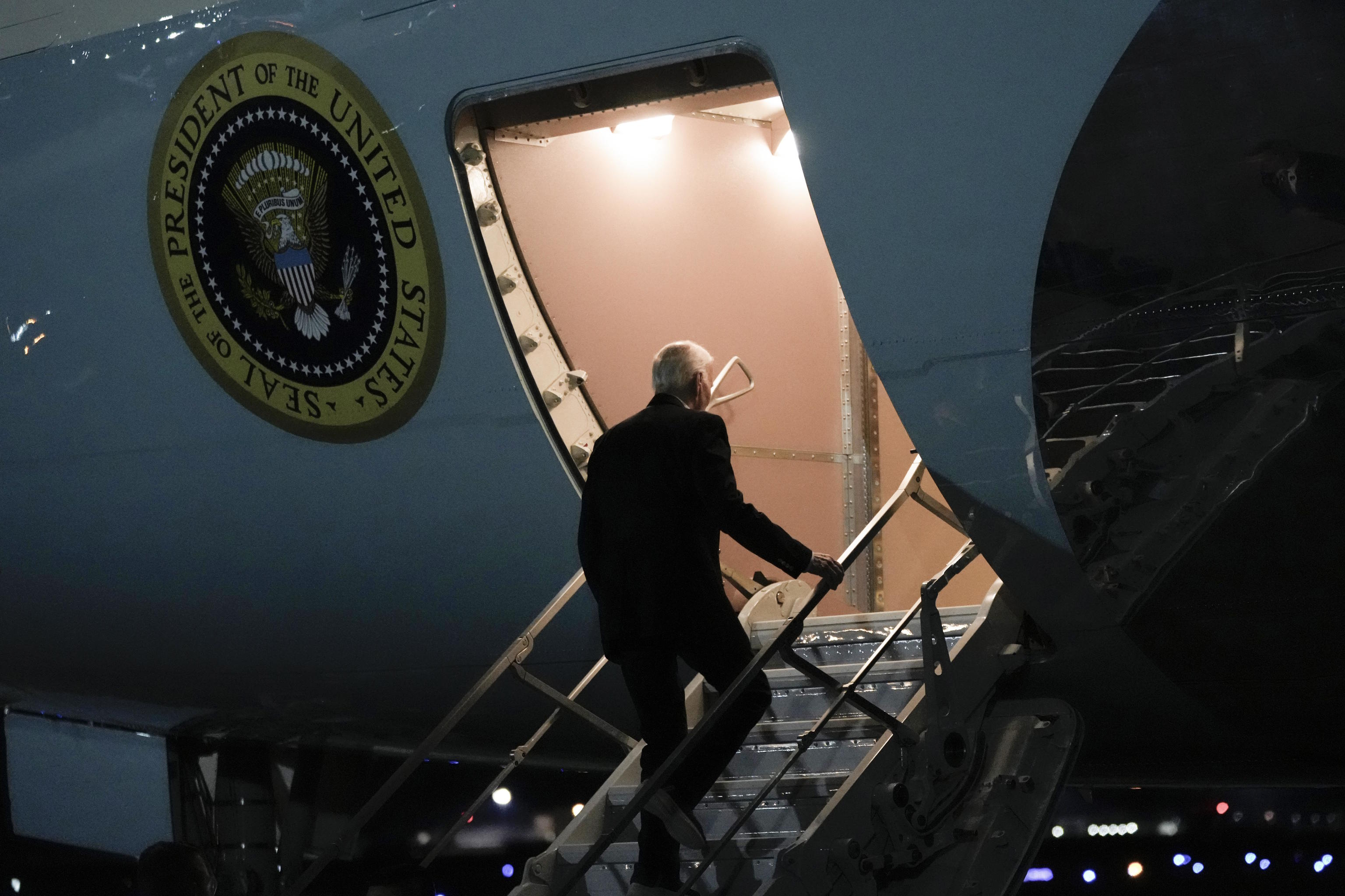 President Joe Biden boards Air Force One.