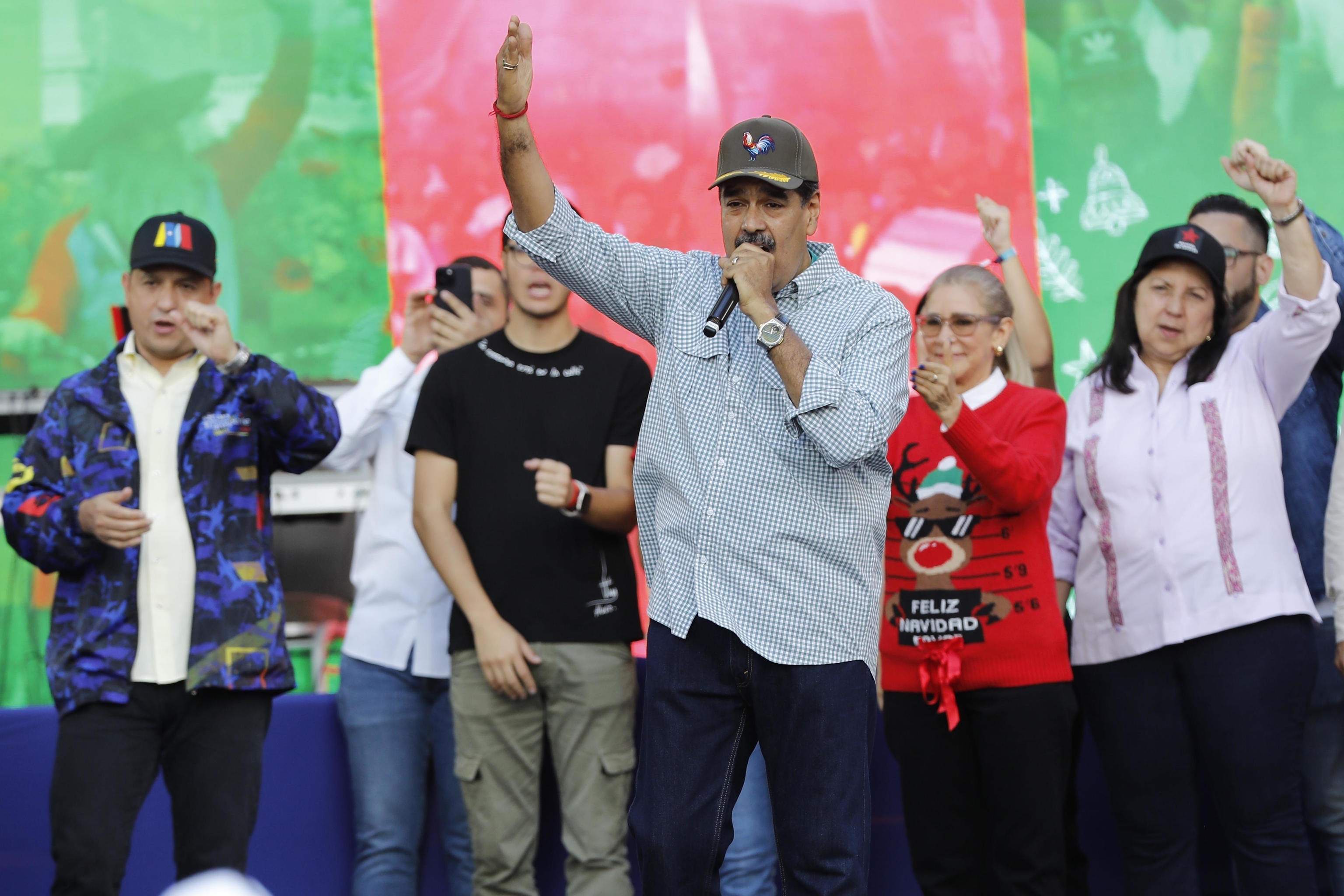 Venezuelan president Nicolas Maduro speaks to supporters during a march.