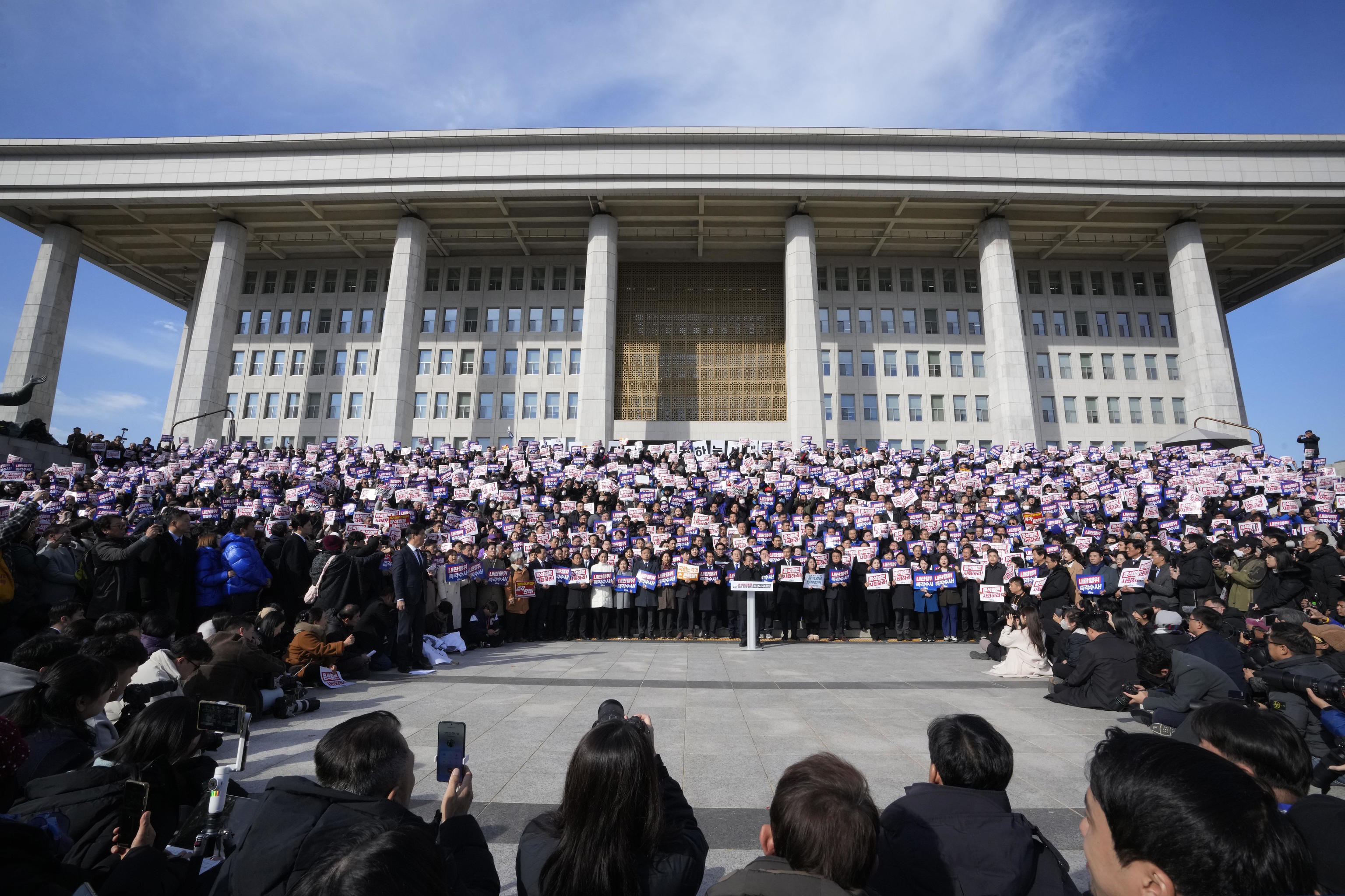 Members of main opposition Party stage a rally against Yoon Suk Yeol.