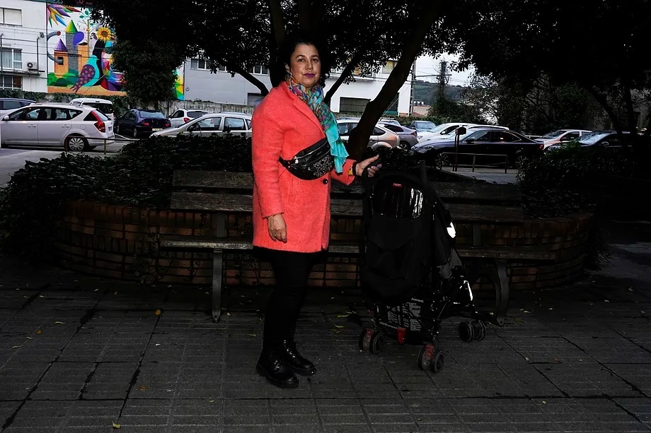 Gloria Mara Lobeto, 58, works at a phone store.