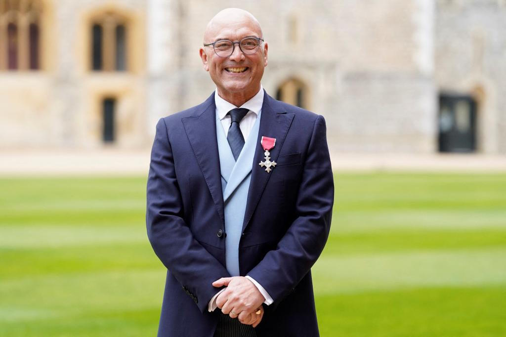 Gregg Wallace poses with his medal of the Order of the British Empire.