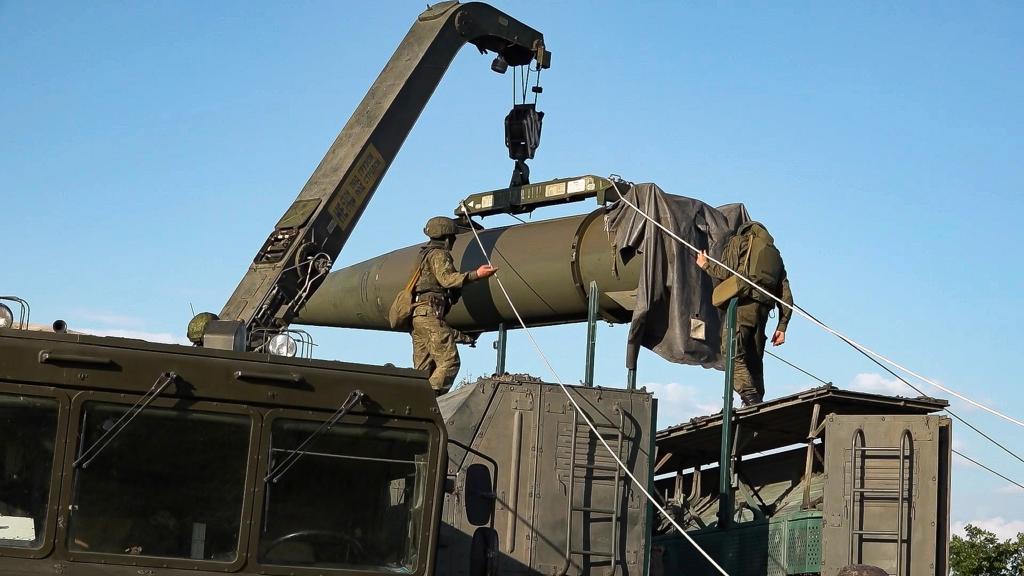 Russian troops load an Iskander missile