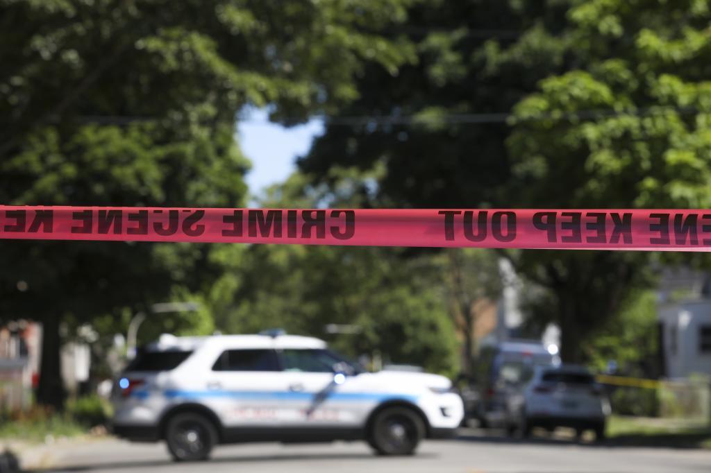 Police tape marks off a Chicago street